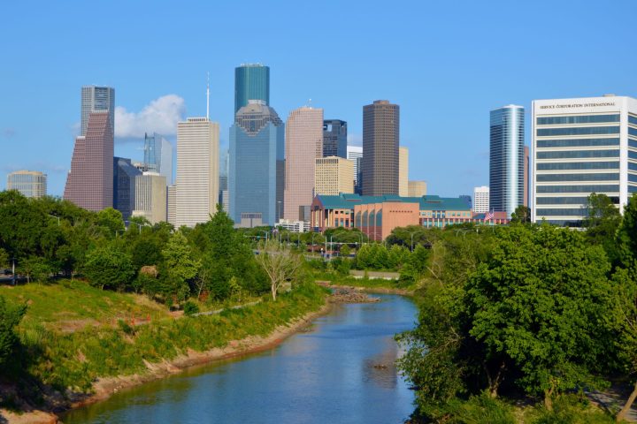 a river with a city in the background